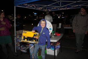 Boy with New Toy Dump Truck