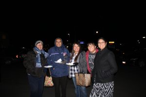 Family Holding Food
